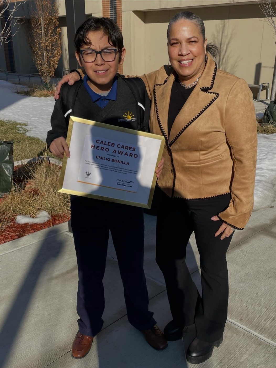 Emilio Bonilla receiving the Caleb Cares Hero Award