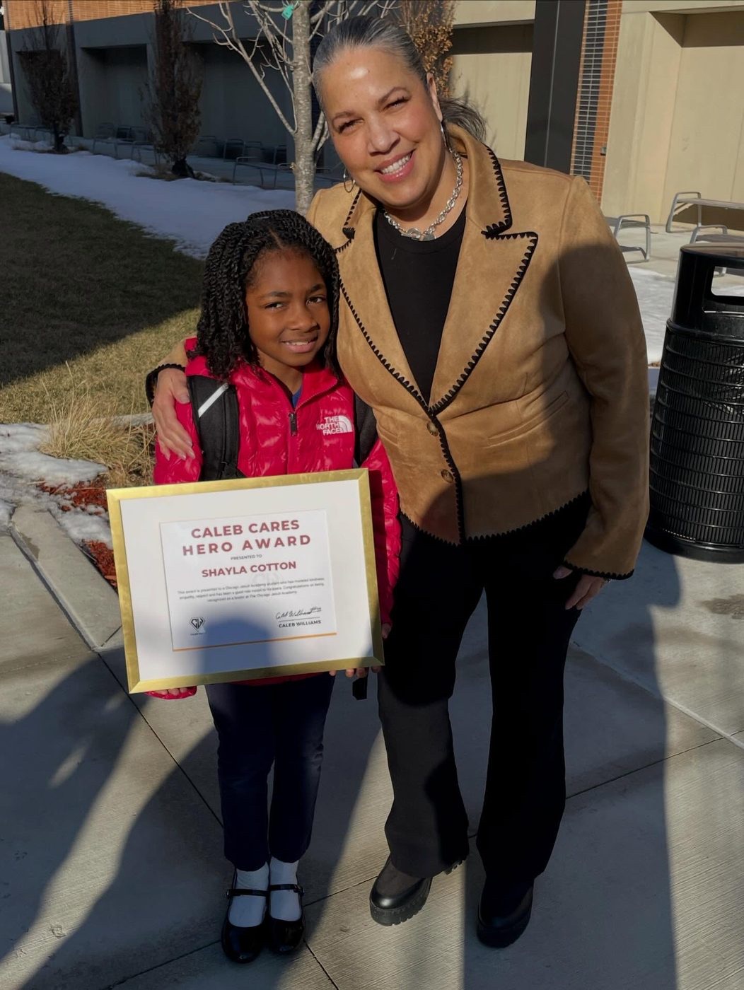 Shayla Cotton receiving the Caleb Cares Hero Award