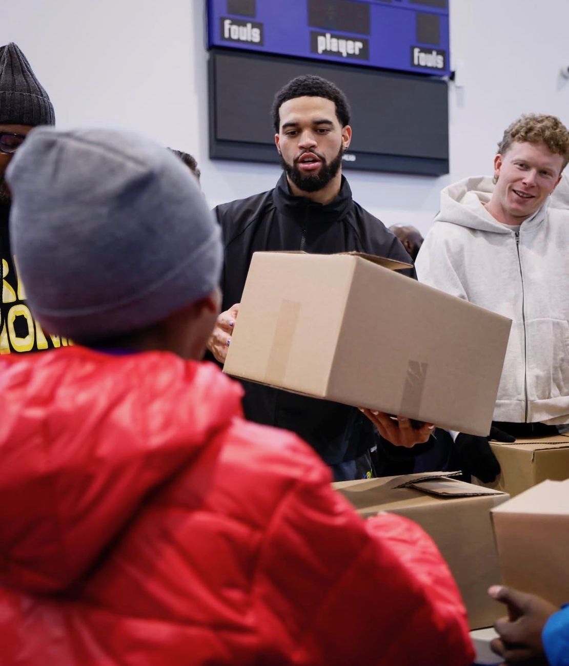 Volunteers distributing boxes at a community event