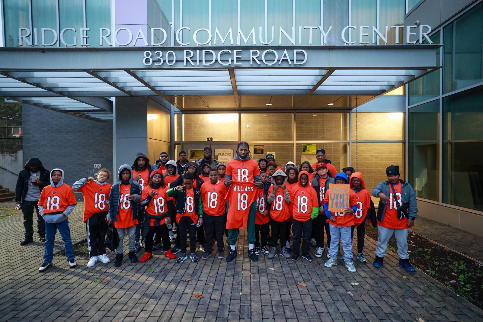 Community members holding a thank you sign